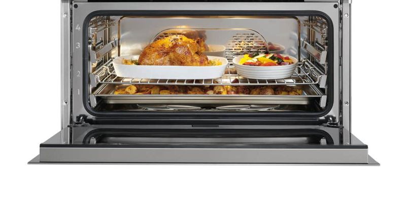Wolf 30" M Series Contemporary Convection Steam Oven, model CSO3050CM/B/T — built-in ovens specified and installed by iKitchen Cabinetry, view 2