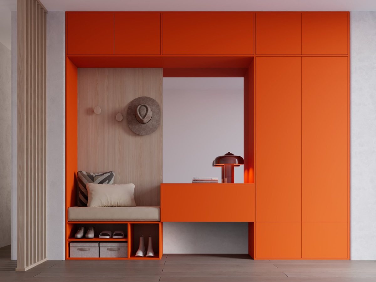 Bright orange ALVIC Naranja Citrus storage wall in an entrance hall with textured panelling
