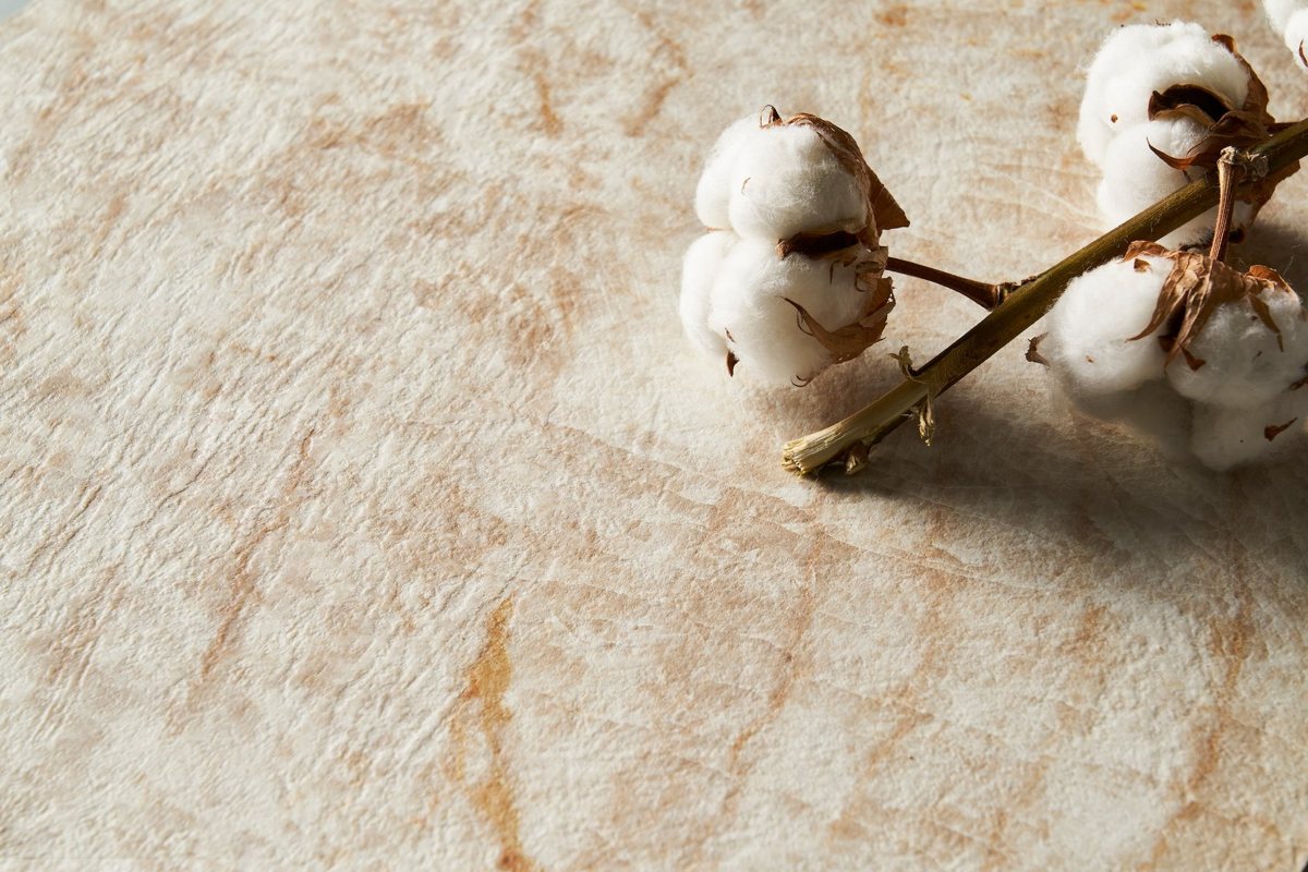 ALVIC Siena beige stone-effect cabinetry with rust-toned veining