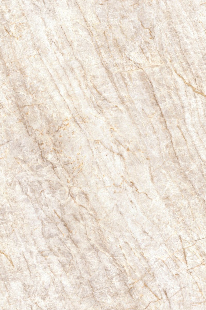ALVIC Siena beige stone panel sample with rust veining in SYNCRON texture