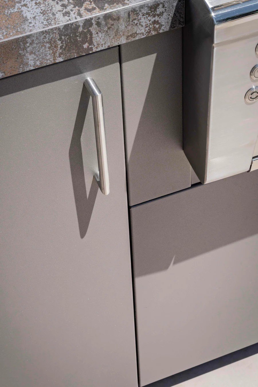 Marine-grade aluminium outdoor kitchen with stone counter