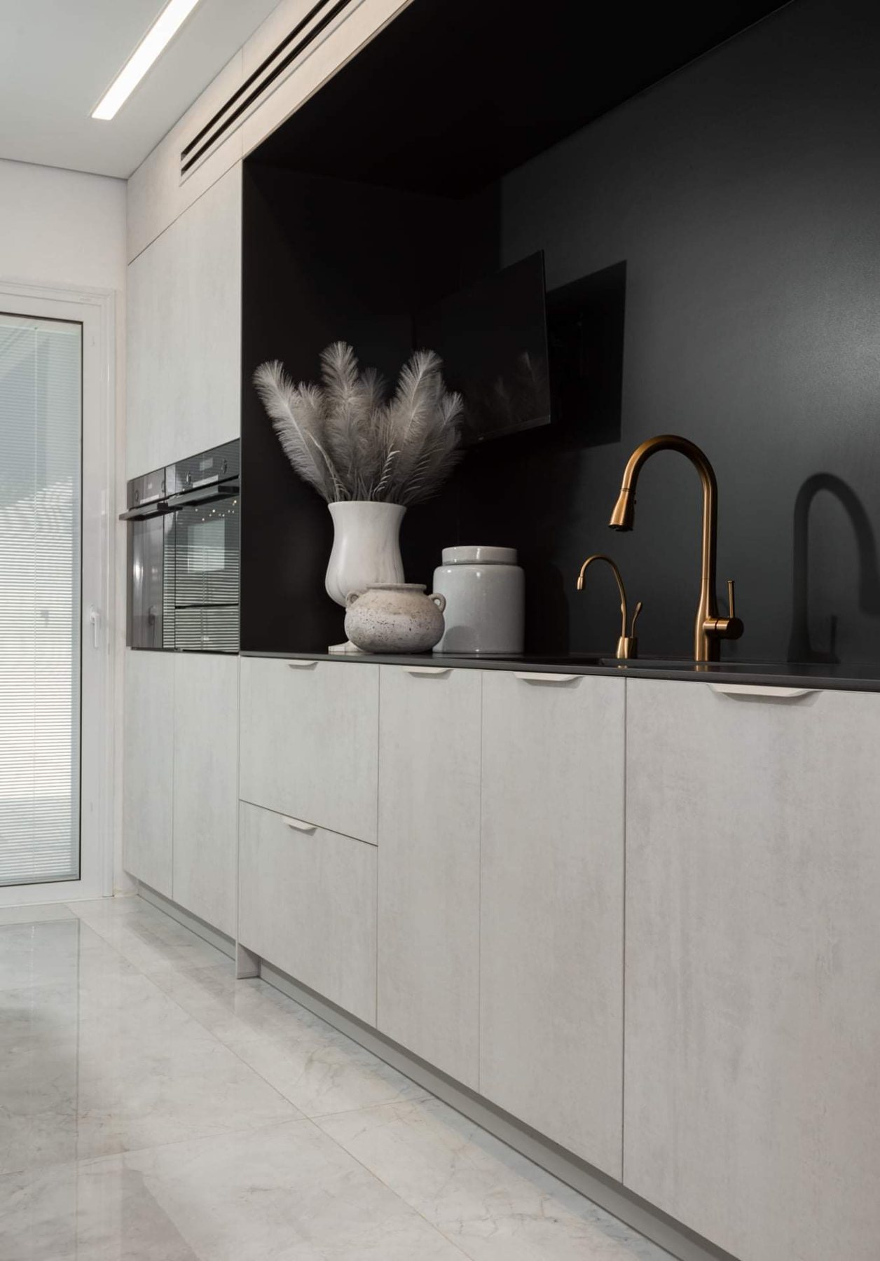 Black Marble Stair House — custom kitchens, built-ins & wall units, wall paneling by iKitchen Cabinetry