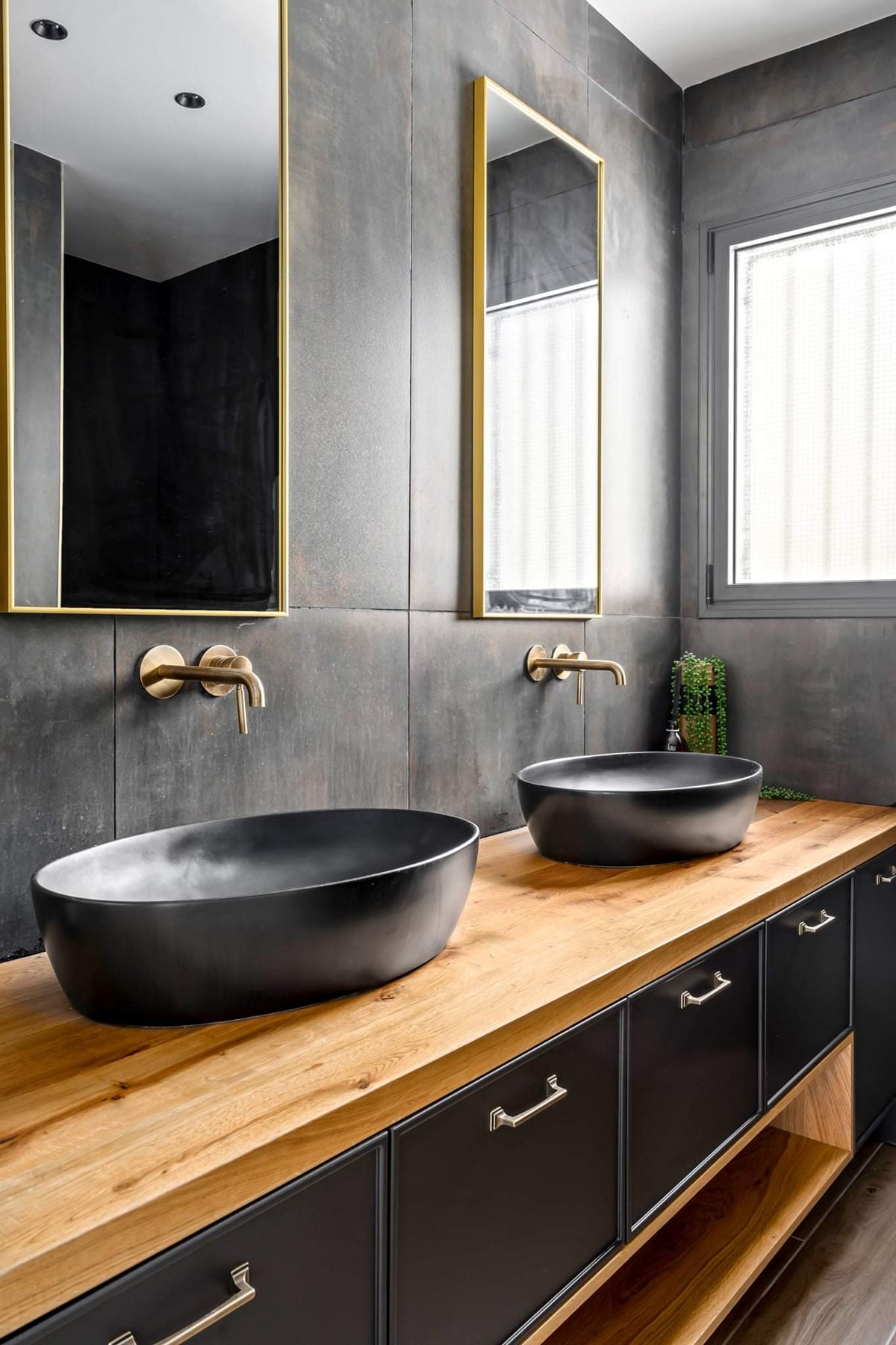 Black Oak and Ochre Apartment — bathroom vanities by iKitchen Cabinetry