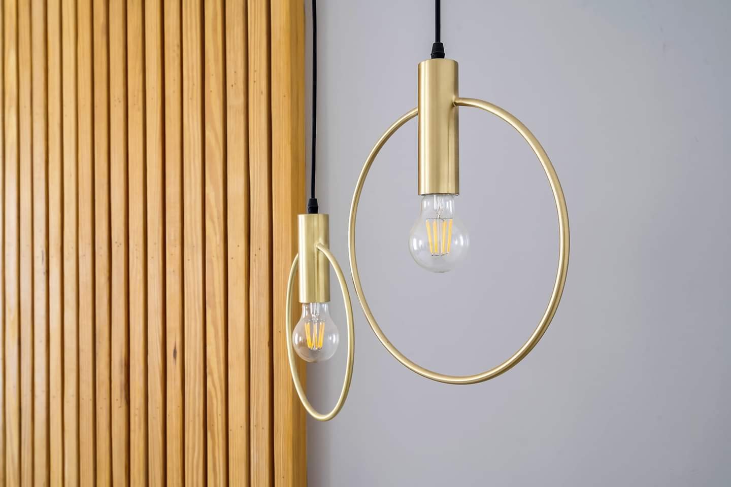 Brass Arc Apartment — wall paneling by iKitchen Cabinetry