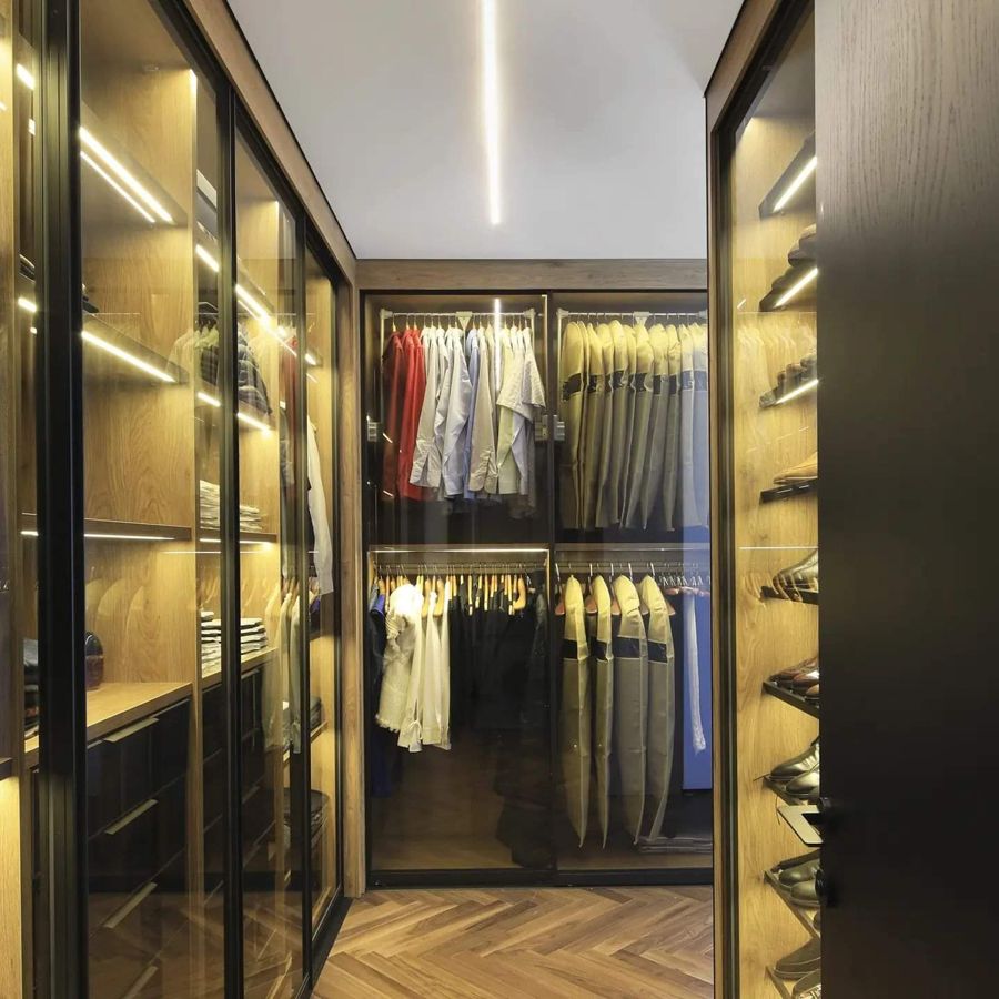 Bronze Glass Dressing Room — walk-in closets by iKitchen Cabinetry