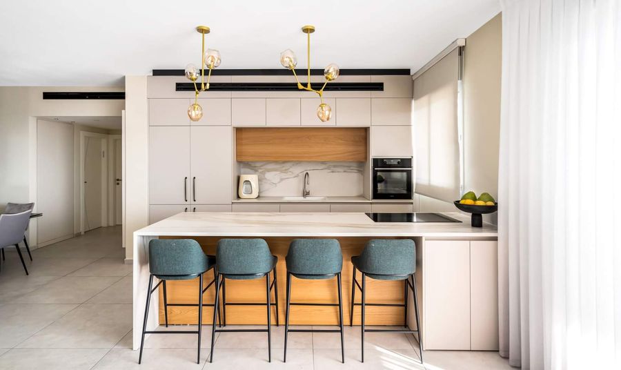 Cream and Antique Brass Apartment — built-ins & wall units, wall paneling by iKitchen Cabinetry