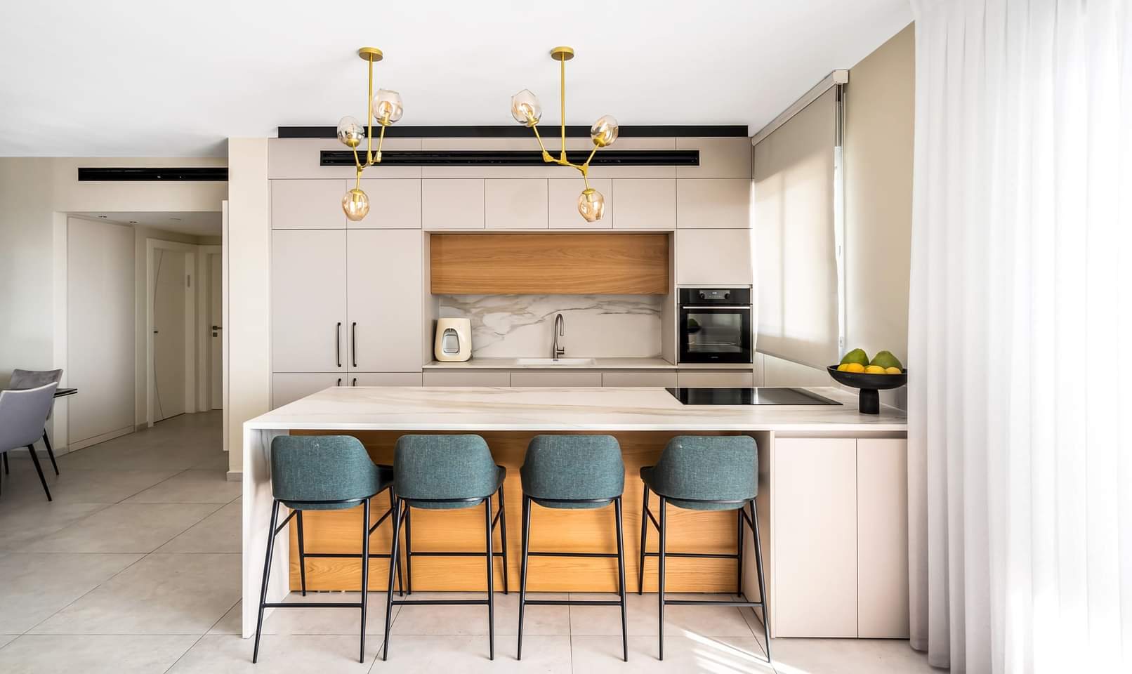 Cream and Antique Brass Apartment — built-ins & wall units, wall paneling by iKitchen Cabinetry
