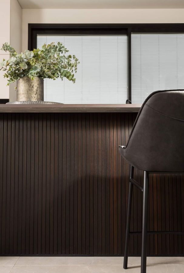 Fluted Walnut Penthouse by iKitchen Cabinetry