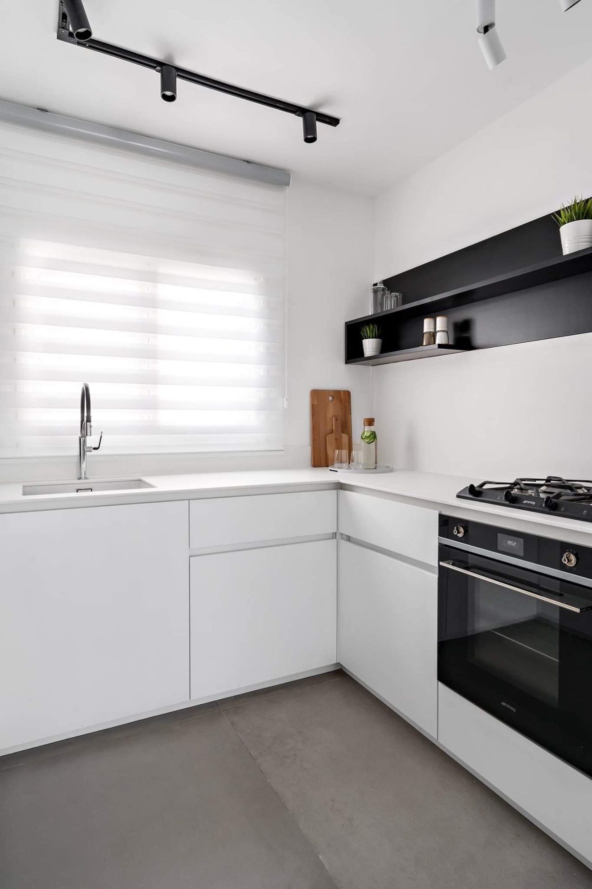 Monochrome Minimal Apartment — custom kitchens, built-ins & wall units, bathroom vanities, walk-in closets by iKitchen Cabinetry