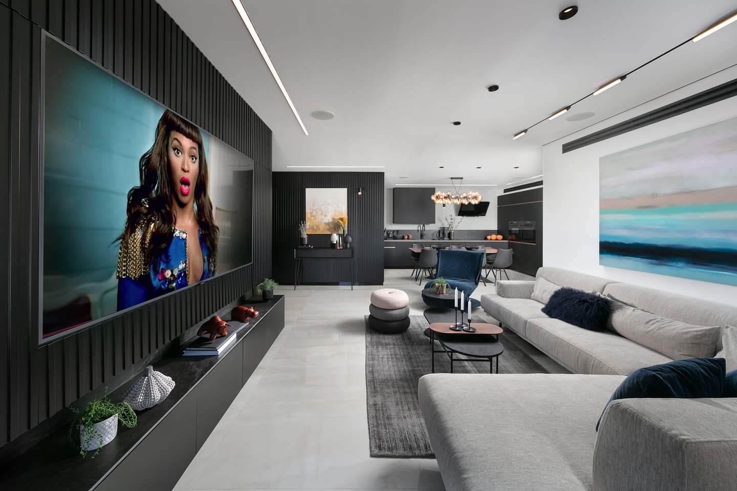 Black fluted wall with an integrated linear fire — custom media wall by iKitchen Cabinetry